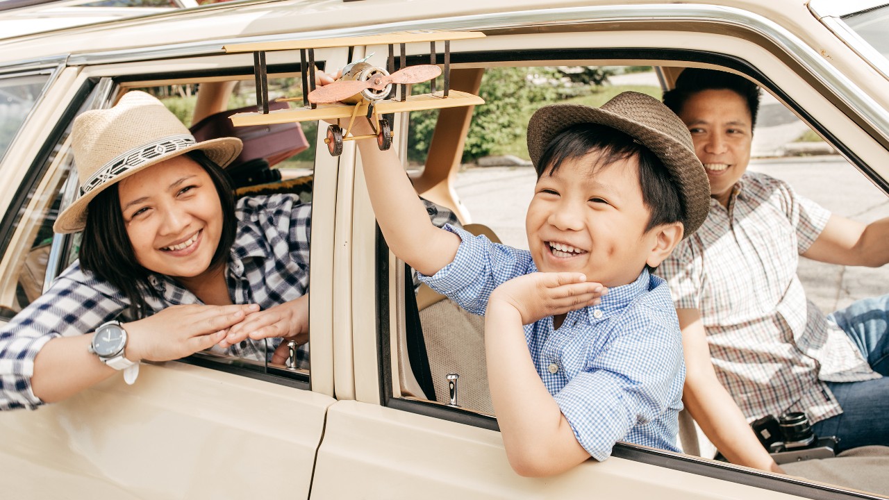 Family in car; image used for Private Car Insurance.